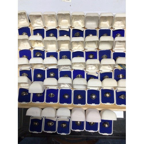 Thirty eight various Chinese white metal rings, all astrological / star sign motifs. Boxed unused.