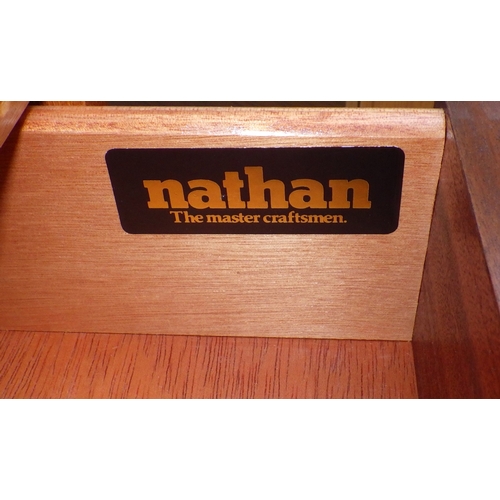 609 - A pair of Nathan teak low bookcases with sliding glass doors, each 102cm wide