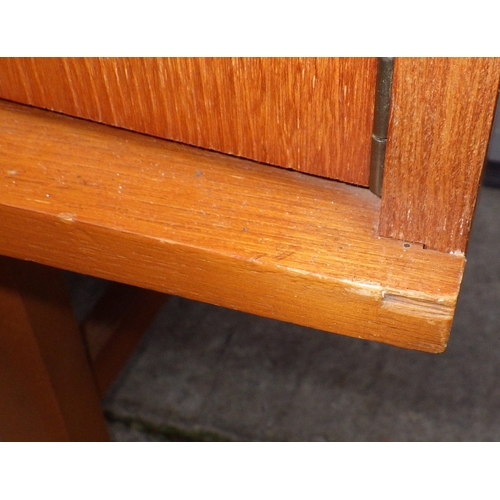 610 - A teak highbooard, some damage to corner, small crack, 151cm wide