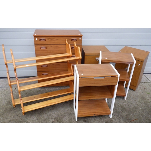 612 - A Schreiber chest of drawers, pair of hanging shelves, pair of bedside chests, two small shelves (7)