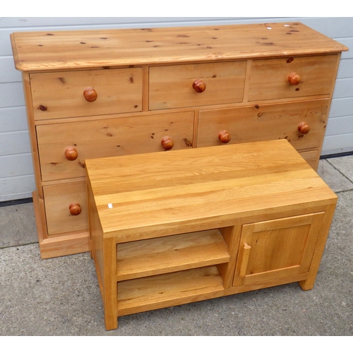 632 - A modern pine chest of drawers, 142cm wide together with a modern light oak t.v stand, marks (2)
