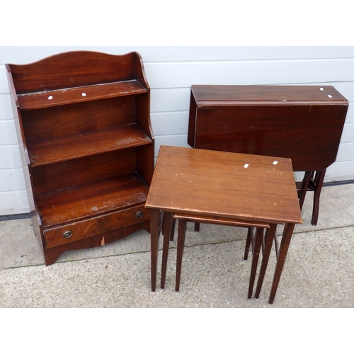 634 - A waterfall bookcase, nest of occasional tables and a Sutherland table (a/f) (3)