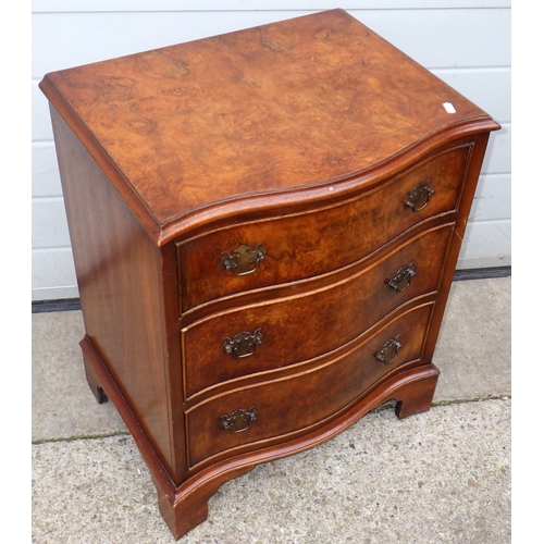 635 - A small walnut serpentine fronted, chest of drawers, 53cm wide