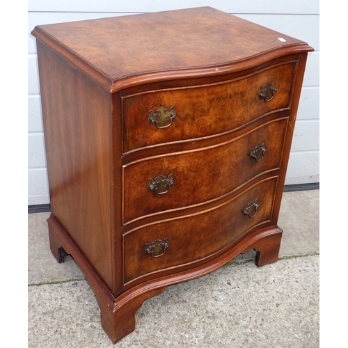 635 - A small walnut serpentine fronted, chest of drawers, 53cm wide