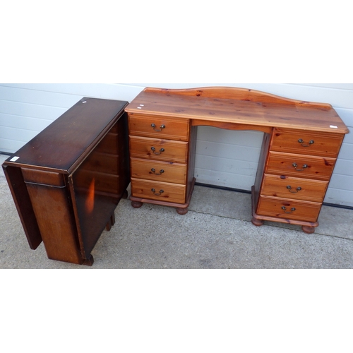 660 - A modern pine kneehole dressing table together with a drop leaf table and a lamp standard (3)