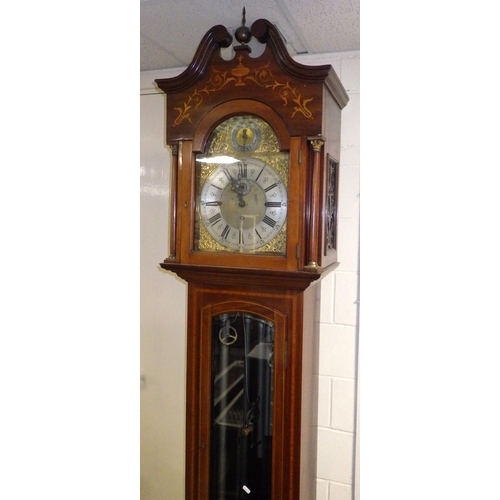 663 - An Edwardian mahogany and inlaid longcase clock with three weights and striking on gongs, 242cm tall... 