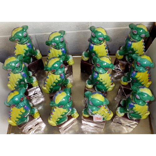 20 - Six pairs of green Foo Dogs, 26cm tall