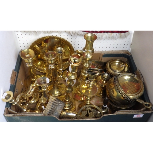 33 - A qty of Indian brass candlesticks etc (2)