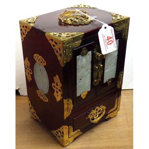 40 - A boxed hardwood soapstone inlaid jewellery cabinet, 22cm tall