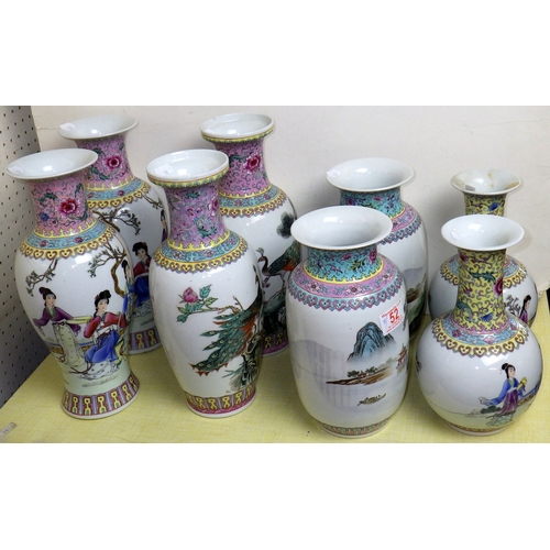 52 - Four pairs of Chinese Famille Rose vases, 24-31cm tall