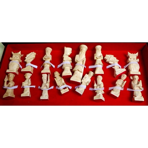 67 - A carved chess set
