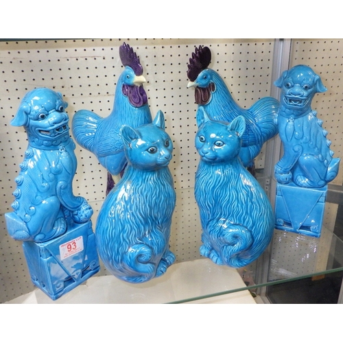 93 - A pair of Foo Dogs, 30cm tall, together with a pair of cats and a pair of cockerels (6)