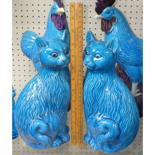 93 - A pair of Foo Dogs, 30cm tall, together with a pair of cats and a pair of cockerels (6)
