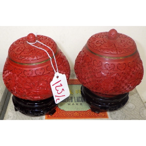 125 - Two pairs of Chinese Red Cinnabar lidded ginger jars with blue enamel interior, 14cm tall
