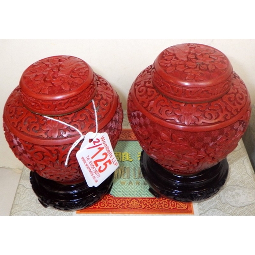125 - Two pairs of Chinese Red Cinnabar lidded ginger jars with blue enamel interior, 14cm tall