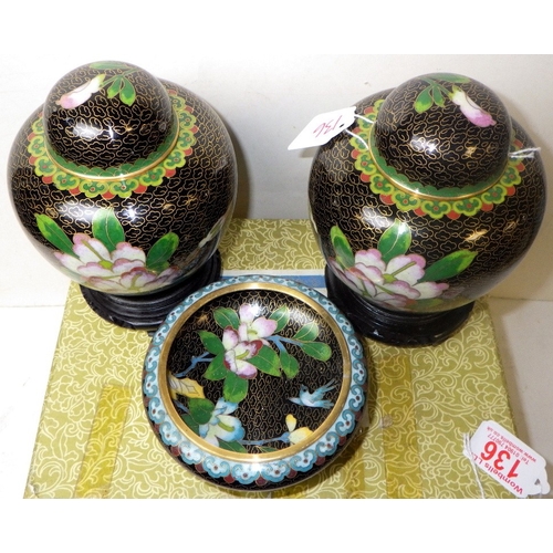 136 - A pair of cloisonné floral ginger jars, 17cm tall, and matching bowl