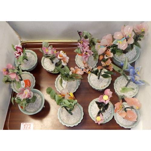 172 - A group of Oriental glass bonsai trees in celadon pots, 10-20cm tall