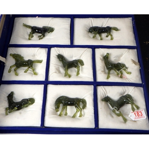 183 - A circa 1960s Chinese jade set of carved horses on wooden stands