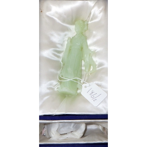186 - Two circa 1960s / 1970s Chinese jade carved female figures on wooden stands (2)