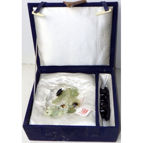 188 - A circa 1960s / 1970s Chinese jade carving depicting a turtle on foliage, presented on a wooden stan... 