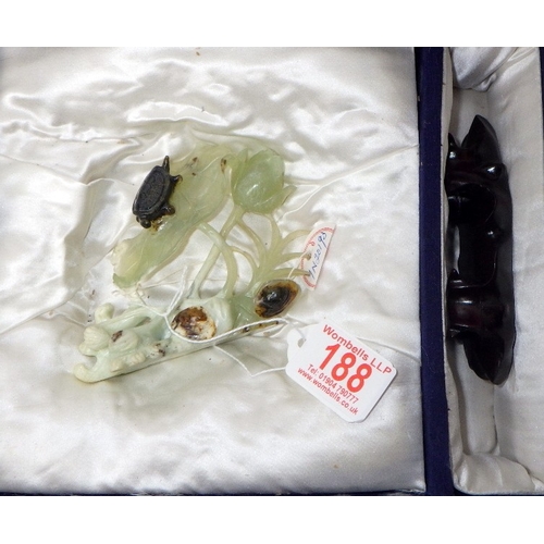 188 - A circa 1960s / 1970s Chinese jade carving depicting a turtle on foliage, presented on a wooden stan... 