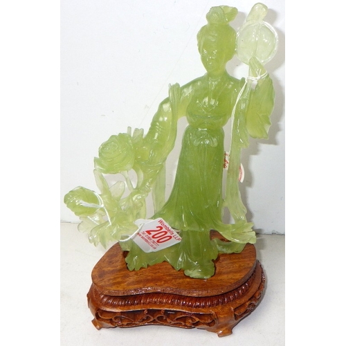 200 - A circa 1960s / 1970s Chinese jade-type carved woman with flowers / celestial figure on a wooden sta... 