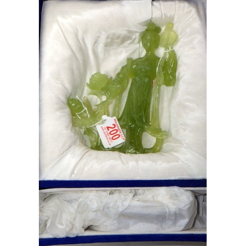 200 - A circa 1960s / 1970s Chinese jade-type carved woman with flowers / celestial figure on a wooden sta... 