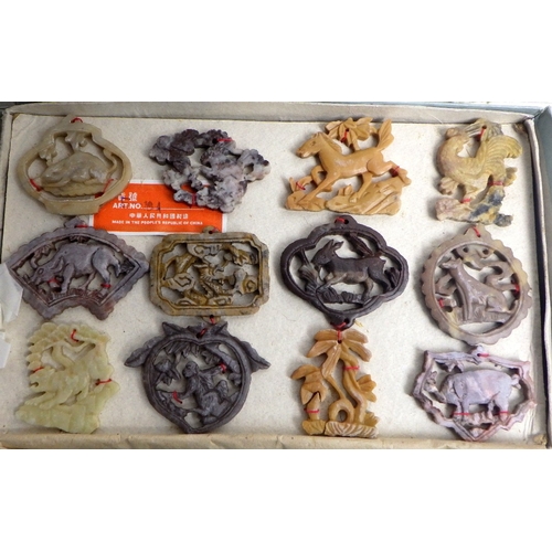 207 - Three boxes of Oriental carved and polished stone amulets (3)