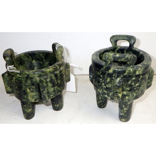 209 - Two Oriental carved and polished stone bowls with handles, one with handle repaired (2)
