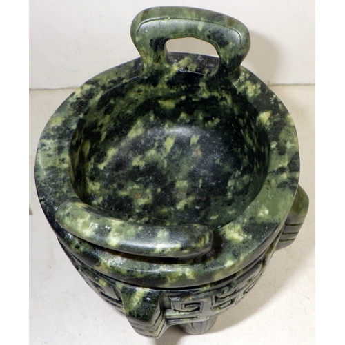 209 - Two Oriental carved and polished stone bowls with handles, one with handle repaired (2)