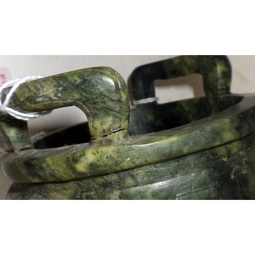 209 - Two Oriental carved and polished stone bowls with handles, one with handle repaired (2)