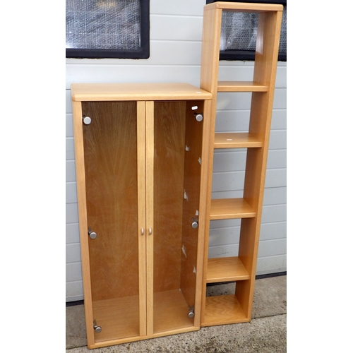 668 - A modern cabinet with glass doors and shelves together with a set of narrow shelves (2)