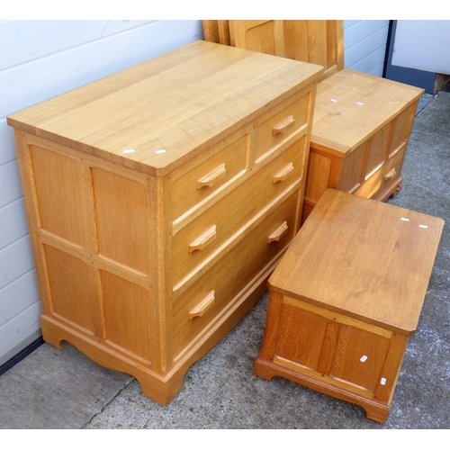 671 - A Coxwold Cabinet Makers, Unicorn Motif,  light oak chest of drawers, 89cm wide, blanket box, three ... 