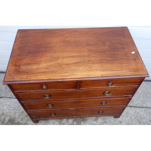 673 - A mahogany chest of drawers, missing one handle, 94cm wide