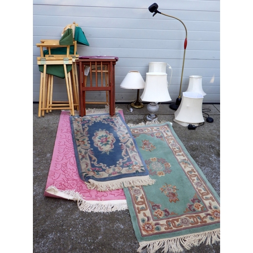 676 - Three Chinese rugs, lamps, various folding chairs