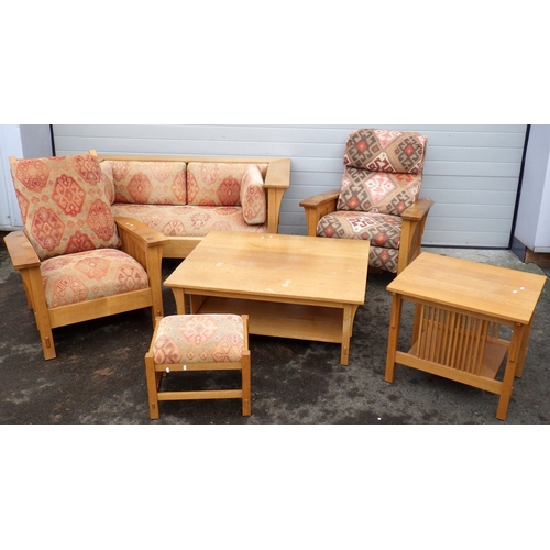 699 - A Stifkey oak suite, settee, armchair, recliner chair, stool, coffee table and an occasional table, ... 
