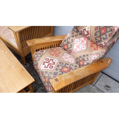 699 - A Stifkey oak suite, settee, armchair, recliner chair, stool, coffee table and an occasional table, ... 