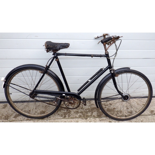 703 - A black Raleigh gents bicycle