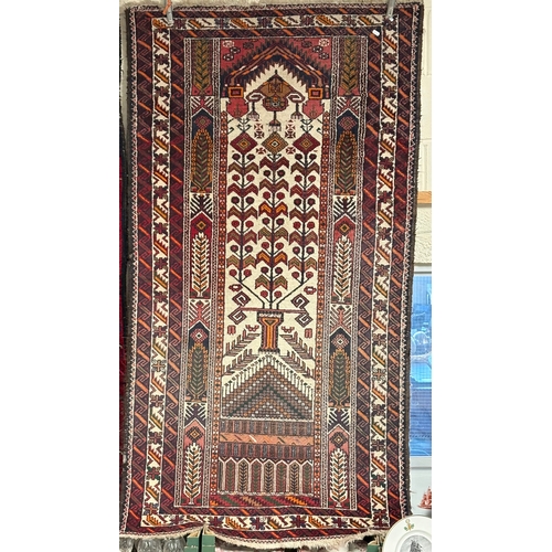707 - A faded Tribal Balouch prayer style Geometric rug  100 x 190cm