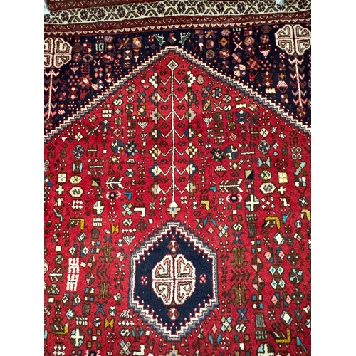 708 - A Persian Abadeh style rug 110 x 160cm