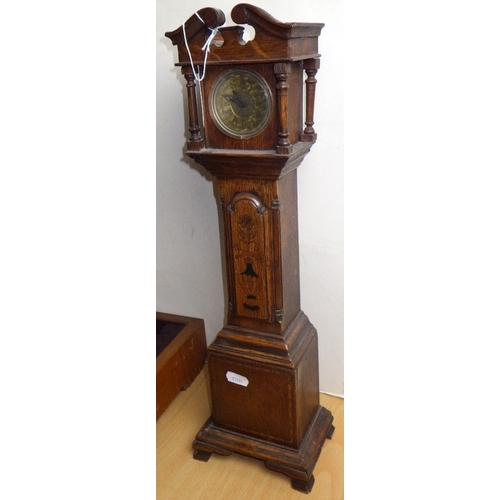 264 - A part canteen of cutlery together with a miniature longcase clock (2)