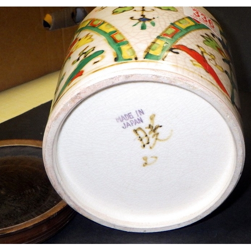 336 - A Japanese floral crackle glaze lidded jar 16cm tall