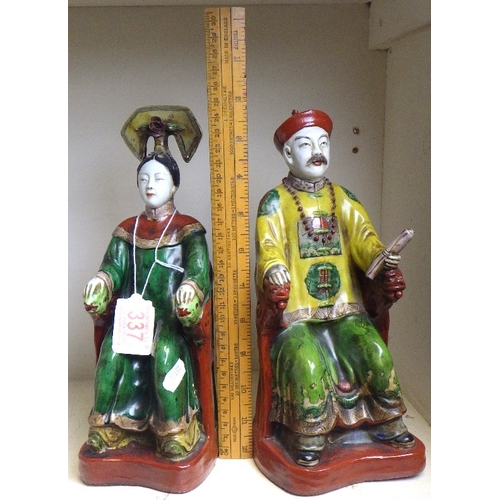 337 - A pair of Chinese ceramic Emperor & Empress figures, 25cm tall