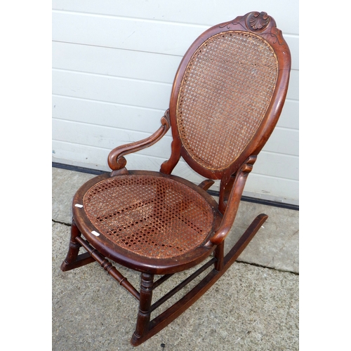 744 - A Victorian pink upholstered nursing chair together with a rocking chair (2)