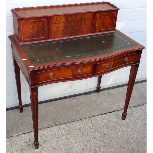 716 - A reproduction mahogany lady's writing table, marks, 92cm wide