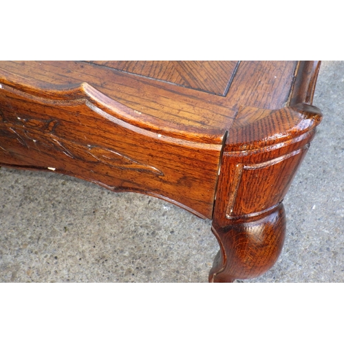 723 - A Thomasville coffee table on cabriole legs, 159cm long,  together with a matching side table, marks... 
