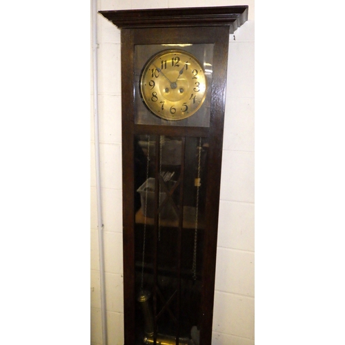 737 - A 1930's oak longcase clock, a/f, dummy weights, 211cm tall