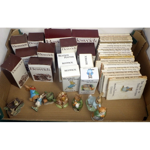373 - A group of Beatrix Potter Beswick figures and books