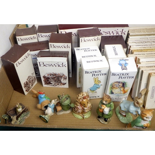 373 - A group of Beatrix Potter Beswick figures and books