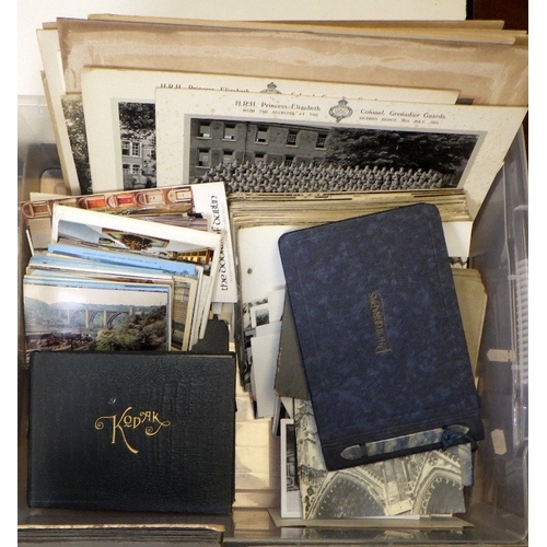 401 - A large qty of vintage photographs and postcards